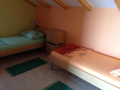 Postel nebo postele na pokoji v ubytování Villa Favola