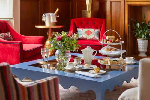 a table with a tray of food on top at The Grosvenor Stockbridge in Stockbridge