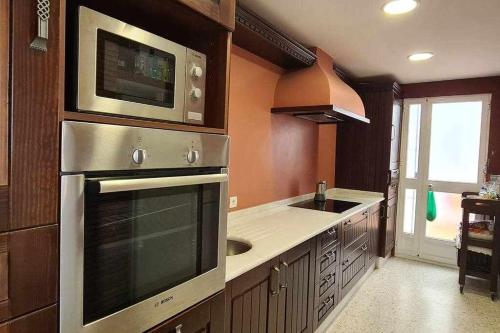 A kitchen or kitchenette at La Casita de Guía by Sanlúcar Housing