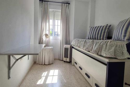 A bed or beds in a room at La Casita de Guía by Sanlúcar Housing