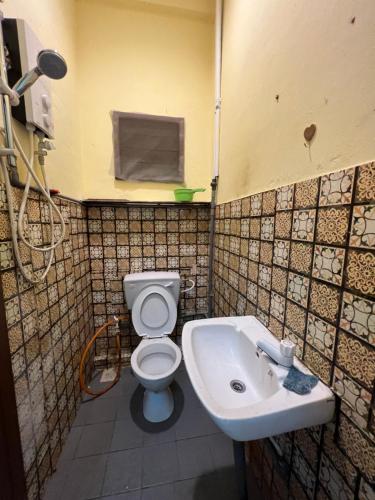 A bathroom at Permai’s Stay