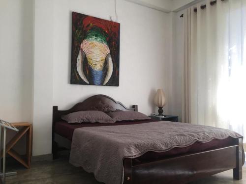 Postel nebo postele na pokoji v ubytování Hasthi homestay