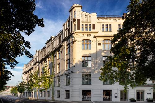 a white building with aire on the side of it at Hermitage Hotel Prague in Prague
