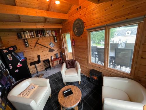 an overhead view of a living room in a cabin at The Gables Whisky B&B in Dufftown