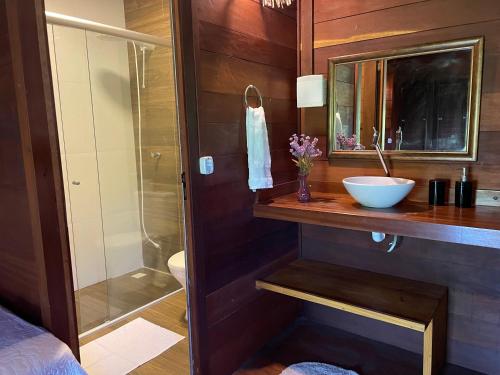 a bathroom with a sink and a shower at Atins Bangalôs in Atins