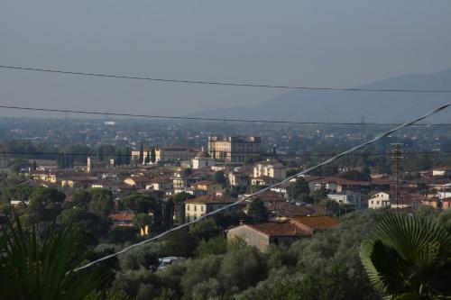 a view of a city from a cable car at Da Poldino in Borgo a Buggiano
