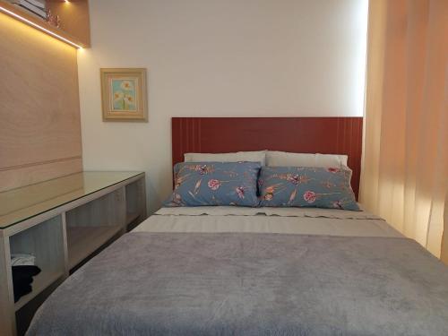 Ένα ή περισσότερα κρεβάτια σε δωμάτιο στο Prime Flat Terê