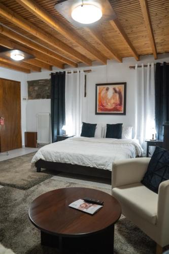 Ένα ή περισσότερα κρεβάτια σε δωμάτιο στο kaimak luxury chalet