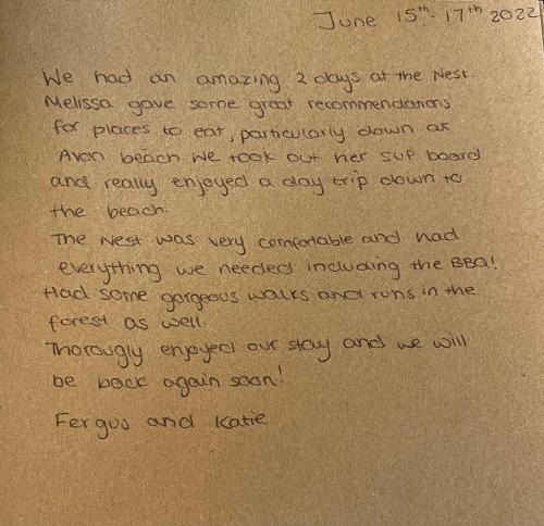 a handwritten letter with handwriting on a piece of paper at The Nest in Sway