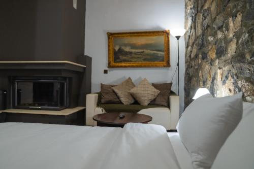 Ένα ή περισσότερα κρεβάτια σε δωμάτιο στο kaimak luxury chalet