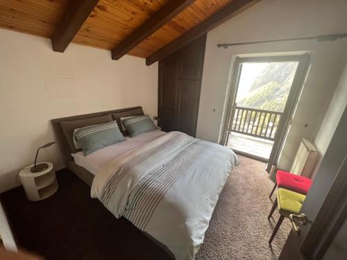 A bed or beds in a room at Ferienhaus-Chalet Breuil-Cervinia Valtournenche