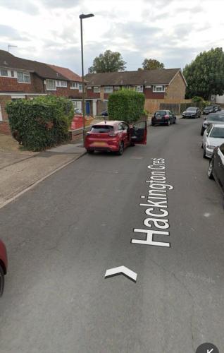 a street with cars parked in a parking lot at Modern Stylish Two Bedroom Apartment in Beckenham