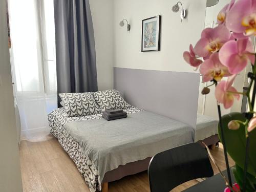 Cama o camas de una habitación en Apartment Paris Studios