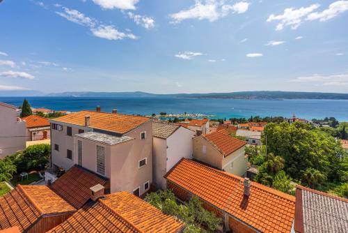 an aerial view of a town with orange roofs at Apartments Lucija in Crikvenica