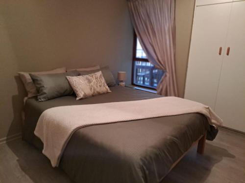 Un pat sau paturi într-o cameră la Cul-de-Stay Self-catering accommodation