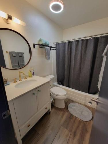 a bathroom with a sink toilet and a mirror at *Msg for 5%off*2Bed1Bath QueenBeds NorthPHX in Phoenix