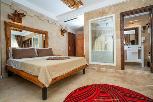 Cama o camas de una habitación en PASHA PALACE HOTEL