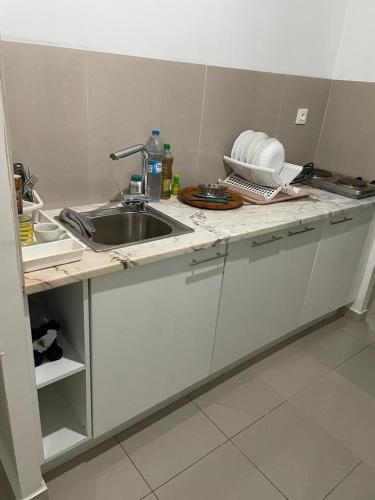 Cuisine ou kitchenette dans l'établissement Maison Residencial casa de ferias