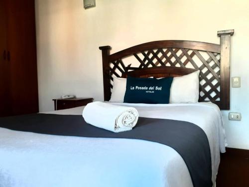 Postel nebo postele na pokoji v ubytování Hostal La Posada Del Sol