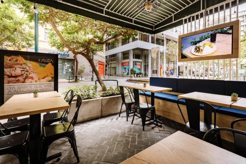 Um restaurante ou outro lugar para comer em TARATA BOUTIQUE HOTEL