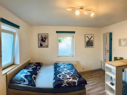 a bedroom with a bed in a room at Útulný apartmán pro odpočinek i základna turistiky in Jablonec nad Nisou