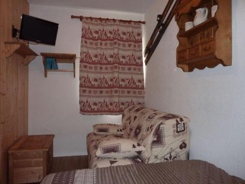 Cama o camas de una habitación en Appartement Les Menuires, 1 pièce, 4 personnes - FR-1-452-137