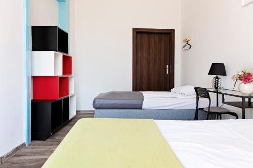 Katil atau katil-katil dalam bilik di Hostel Królewska