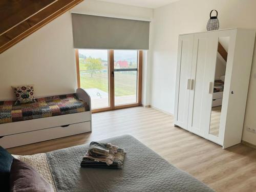 Katil atau katil-katil dalam bilik di Apartman Detvianka 1