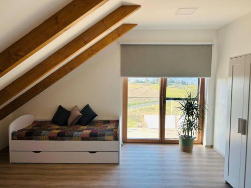 Katil atau katil-katil dalam bilik di Apartman Detvianka 1