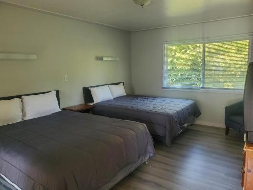 Krevet ili kreveti u jedinici u okviru objekta Lake Trail Motel