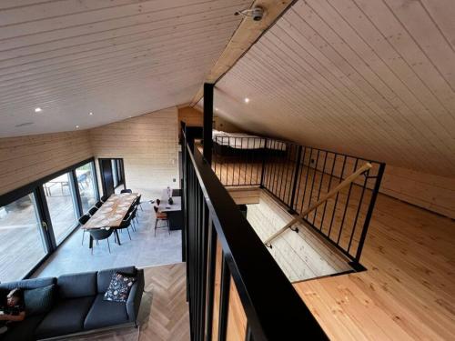 an overhead view of a living room and dining room at Himos Villa Golden in Jämsä