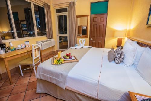 Ένα ή περισσότερα κρεβάτια σε δωμάτιο στο Best Western Posada Freeman