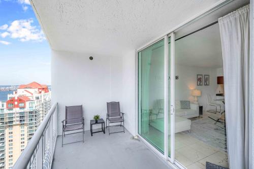 a balcony with a view of a building at Modern 1 Bed in the Heart of Brickell With Free Parking in Miami