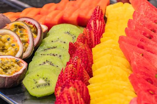 a tray filled with fruit on top of a plate at GHL Collection 93 in Bogotá