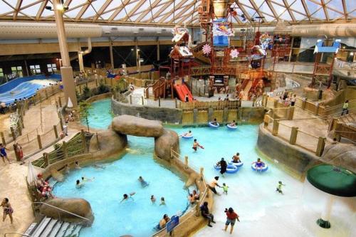 a group of people in a water park at Zen Spa Oasis Retreat Sauna/Hotub/Firepit/Fun/Gameroom in Blakeslee