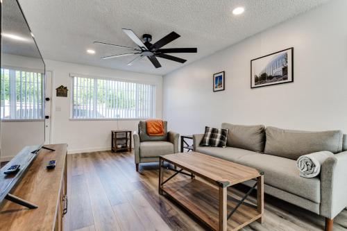a living room with a couch and a ceiling fan at Modern Retreat near UofO, Autzen Stadium, Amazon Park #2 in Eugene