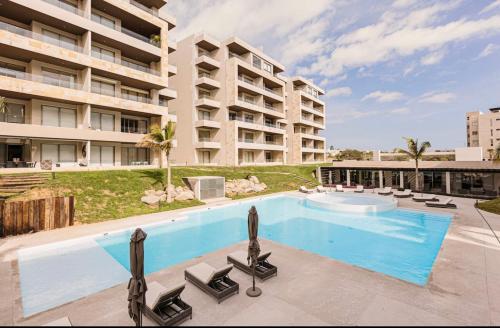 Bazén v ubytování Loft con balcón privado, estacionamiento gratis - Un oasis en Los Cabos nebo v jeho okolí