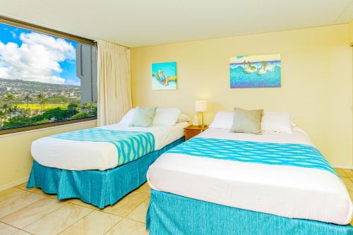 Ένα ή περισσότερα κρεβάτια σε δωμάτιο στο Mountain View Condo Near Beach with Free Parking!
