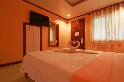 TV a/nebo společenská místnost v ubytování Nigi Nigi Too Beach Resort