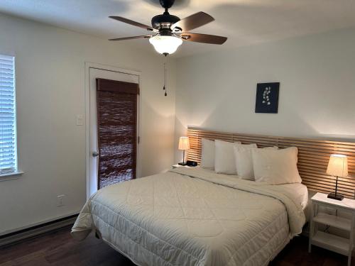 En eller flere senge i et værelse på Grandview 7 Townhouse