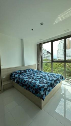 Postel nebo postele na pokoji v ubytování Cosy 1 bedroom apartment Pratamnak area