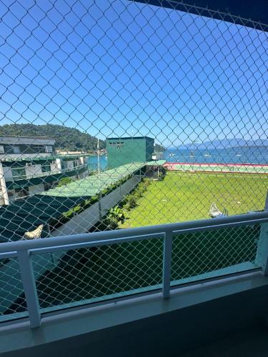 a view of a football field from a fence at Angra inn, Angra dos Reis in Angra dos Reis