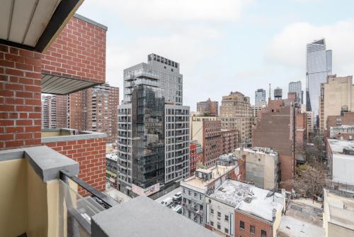 a view of the city from the balcony of a building at Eden, dream high-end home in NYC in New York