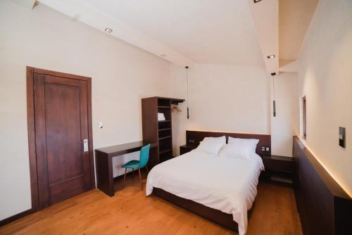 Postel nebo postele na pokoji v ubytování Puerta Vieja Hostel