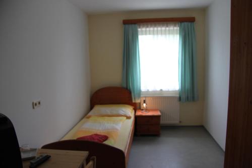 Cama o camas de una habitación en Pension Merkinger