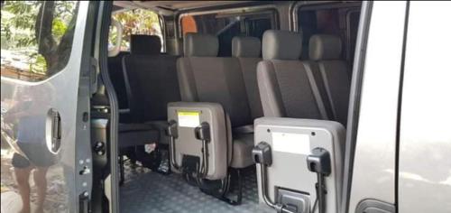 a van with the back doors open with luggage in it at VAN FOR RENT in Manila
