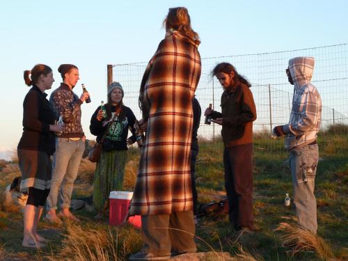 a group of people standing around in a field at Jungle Monkey Backpackers in Port St Johns