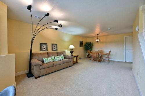 a living room with a couch and a table at Unit 109 2 BDRM 2 BA condo in Birchwood