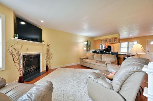 a living room with two couches and a fireplace at Unit 109 2 BDRM 2 BA condo in Birchwood