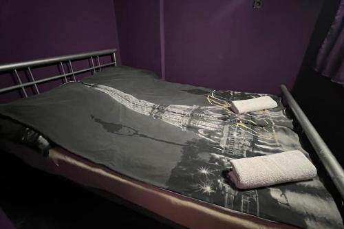 מיטה או מיטות בחדר ב-St. Eric Appartman